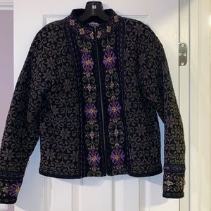 Nordic jacket, black with green flower and purple detail.